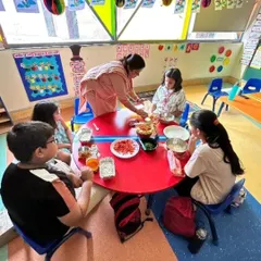 Teamwork and cultural learning come together in our Little Chefs program. Here, a group of campers collaborates to prepare Bhel Puri, a popular Indian snack, learning about different ingredients and the importance of hygiene and cooperation in the kitchen.