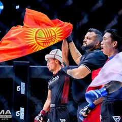 Raising a champion's hand. Being in the center of the action at the highest level of amateur MMA helps me understand what it takes to win.