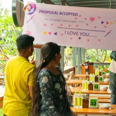 This is the moment it all leads to. After a surprise flashmob, the "Proposal Accepted" banner is revealed, capturing the pure joy and emotion of the couple as they start their new journey together.