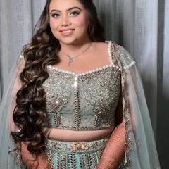 Big, bouncy waves are perfect for a Sangeet night. This style has lots of movement for dancing and is designed to hold its shape all evening.