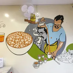 A detailed view of the chai-wallah section from a restaurant mural project. We use bright colors and a distinct illustrative style to make the scenes pop, creating a lively backdrop for the dining area.