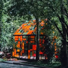 The stunning stained-glass house, one of the many unique and picturesque spots you'll find while exploring the property.