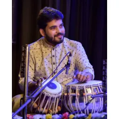 A candid moment from a concert in Kolkata, captured beautifully. Sometimes, the moments between the notes are just as expressive.