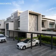 A closer look at the sleek lines and modern elegance of Residence 338's exterior. The cantilevered structures and material choices reflect a contemporary architectural language.