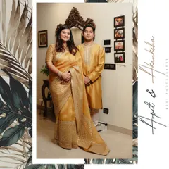 A classic portrait of a couple in matching golden outfits for their Roka ceremony. The elegant border and script text add a touch of sophistication to this formal shot.