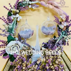 A close-up of our Parisian dream ring platter. The crystal Eiffel Tower and hanging glass orbs for the rings create a magical effect.