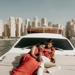 A serene moment on a private yacht with the iconic Dubai Marina skyline in the background. This showcases the luxurious and exclusive destination shoots I offer.