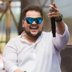 On the mic and feeling the love from the massive Holi festival crowd. My goal is to make sure every single person feels connected to the music.