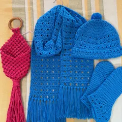 I also make cozy crochet items for winter. This set, made for a young boy, includes a warm blue muffler, a matching beanie cap, and socks. A pink macrame pot holder was also part of this custom order.