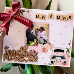 We love making memories special. This custom canvas frame features a couple's photo, Scrabble tiles, and wooden cutouts to celebrate their 'together forever' journey.