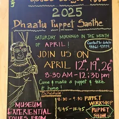 Our Dhaatu Puppet Santhe offers a full day of activities. This schedule board outlines the program, which includes museum experiential tours, hands-on puppet making workshops, and live puppet shows for all ages.