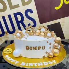 A chic 1.5kg white and gold cake decorated with golden stars and spheres.