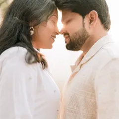 Backlit by the soft sun, this intimate close-up of Nutan and Shubham is all about their connection. It's a simple, tender moment that feels both timeless and real.