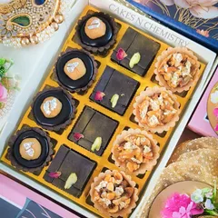 This close-up shows the detail in my assorted tart box, a popular choice for Diwali gifting. It includes a mix of chocolate motichoor tarts, brownie squares, and nutty tarts, offering a perfect blend of modern and traditional flavors.