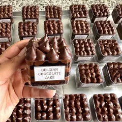 This image showcases a bulk delivery of my Belgian Chocolate Cake tubs. Each individual portion is rich, decadent, and beautifully presented, making it an ideal choice for corporate events or employee appreciation gifts.