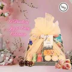 A bundle of joy for any celebration, this hamper is elegantly wrapped in yellow netting. It's packed with snacks, drinks, and other surprises, making it a versatile gift for a baby shower, birthday, or thank you gesture.