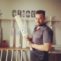 A player visiting our store to select a new bat. We enjoy helping cricketers find gear that feels right and improves their performance.