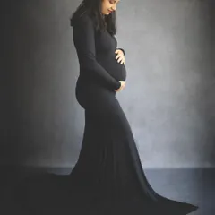 A solo portrait is all about celebrating the incredible journey of motherhood. We use simple, elegant posing and lighting to create a timeless silhouette that beautifully highlights the baby bump, capturing the miracle of growth in a single frame.