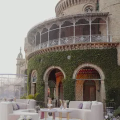 A reception at a majestic castle, where we designed the decor to complement the grandeur of the architecture. The pastel hues and soft lighting created a romantic, storybook atmosphere.