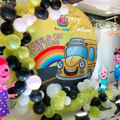 A closer look at the Cocomelon birthday backdrop. The vibrant print and cheerful characters are perfect for a toddler's party.