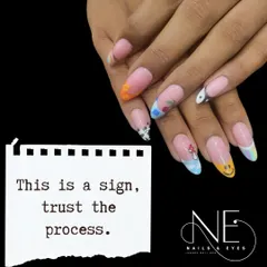 Learn to create modern, character-based nail art. This set features custom designs on each nail over a French manicure base, a popular trend that combines classic technique with playful, personalized art.