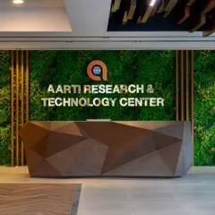 First impressions are everything. I designed this reception desk to be a piece of sculpture, with faceted angles that catch the light. Paired with the green moss wall and glowing company logo, it sets a creative and modern tone the second you walk in.