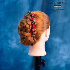 A classic rose bun hairstyle created on a mannequin. We teach you how to sculpt hair into beautiful shapes, like this floral design.