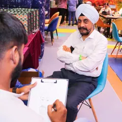 A unique party favor and activity in one. Our caricature artist is seen here sketching a guest, providing a personalized and memorable keepsake from the celebration.