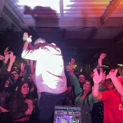 A photo from a recent gig, with the crowd's hands in the air. Pure weekend energy.