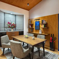 In the Valley of Dreams, this dining area is wrapped in the warmth of reclaimed wood. The custom dining table and our ergonomically crafted Ashton Chairs are framed by a large bay window, creating a corner that speaks of sustainability and slow living.