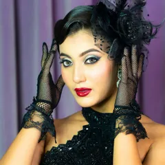 This pose highlights the dramatic eye makeup and the overall mood of the look. This is the kind of work that helps an artist stand out and is a focus in my advanced classes.