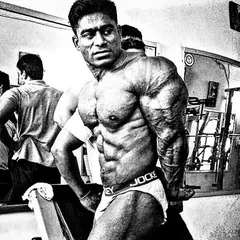 This is the result of discipline and sacrifice. A stage-ready physique isn't built with shortcuts. This black and white shot shows the kind of conditioning and muscle maturity we aim for in my contest prep programs.