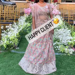 This client chose a beautiful pastel lehenga with colorful embroidery and mirror work for her special event.