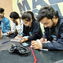 A closer look at students during a workshop focused on mastering interior contracts. I believe in hands-on learning, where you are actively engaged in drafting, analyzing, and understanding the critical details that protect you as a designer.