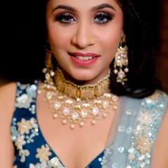 A direct look at the engagement makeup. You can see the flawless full-coverage foundation, the blended eyeshadow, and the beautiful kundan choker that completes the look.