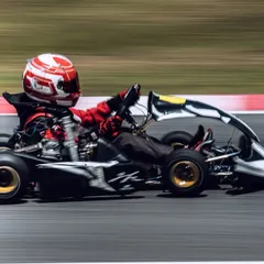 Our driver in a black and red kart during the RMC Asia Trophy, showing speed and commitment in his international debut.