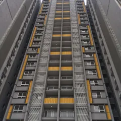 A duplicate image of the Salarpuria Sattva Opus residential apartment building.