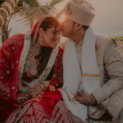 A tender forehead kiss right after the beachside Pheras. The setting sun, the sound of the waves, and this quiet moment of love make for a truly magical memory.