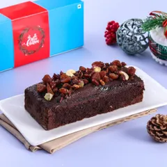 A closer look at our rich and moist Christmas plum cake, beautifully packaged and ready for gifting. It’s the taste of Christmas in every bite.
