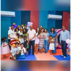 A great group photo of the entire party, kids and adults, celebrating together. My space is designed to comfortably accommodate families and friends.