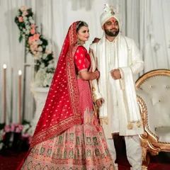 A classic portrait of the bride and groom in their stunning wedding attire. I ensure we capture these essential, posed shots that become timeless family heirlooms.
