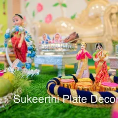 The heart of my decorations is the handmade dolls. Here you can see a close-up of a traditional couple doll set, crafted with attention to detail, which adds a beautiful, personal touch to any ceremony.