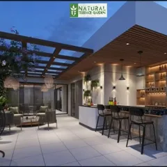 Proposed design for a luxurious rooftop bar and lounge in Janakpuri. This 3D render highlights a fully equipped bar, a semi-covered seating area, and a swing chair, showcasing a complete entertainment hub.
