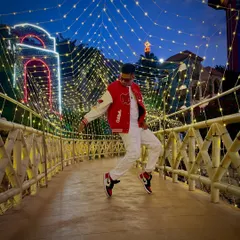 Golden vibes and the OG pose. A stylish shot on a brightly lit bridge, showing off my love for fashion and classic moves.