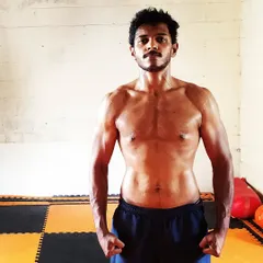 Your body is your weapon, keep it strong. A post-workout shot after a strength training session.
