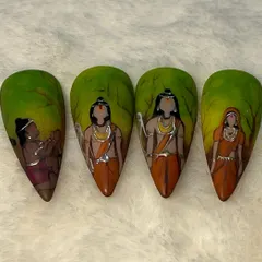 "Ram Aayenge." This nail art set was created to celebrate the inauguration of the Ram Mandir in Ayodhya, depicting Ram, Sita, Lakshman, and Hanuman.