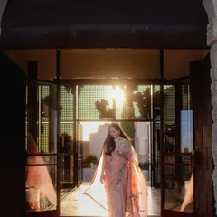 The bride, Shikha, glowing in the golden hour, wearing a contemporary drape by Anamika Khanna that perfectly captured the fusion of Indian legacy and modern elegance.