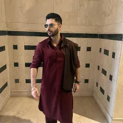 My trademark Pathani suit, worn with effortless style by actor Mikhael Kantroo. This deep maroon ensemble is a perfect example of bold, timeless design, tailored for a sharp silhouette that commands attention.