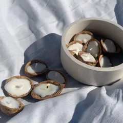 We made these cute little walnut shell candles for a customized order. We can create custom designs for orders as low as 50 pieces.