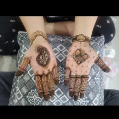 A minimal design featuring a bold paisley on one hand and a floral motif on the other. It's a great option for someone who wants something unique but not overwhelming.